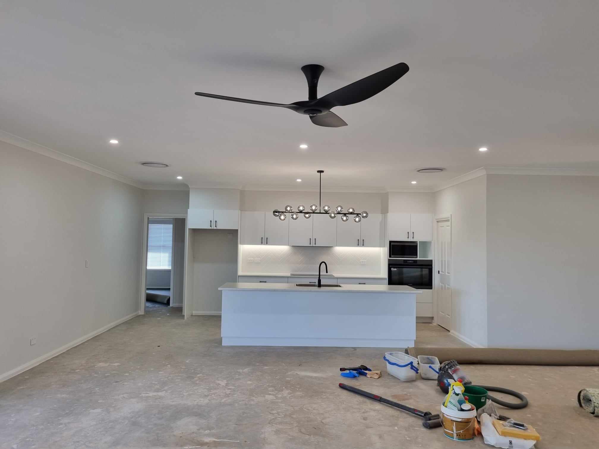 Ceiling fan with light kit installed in an open-plan Cowra home by H1 Electrical & Air
