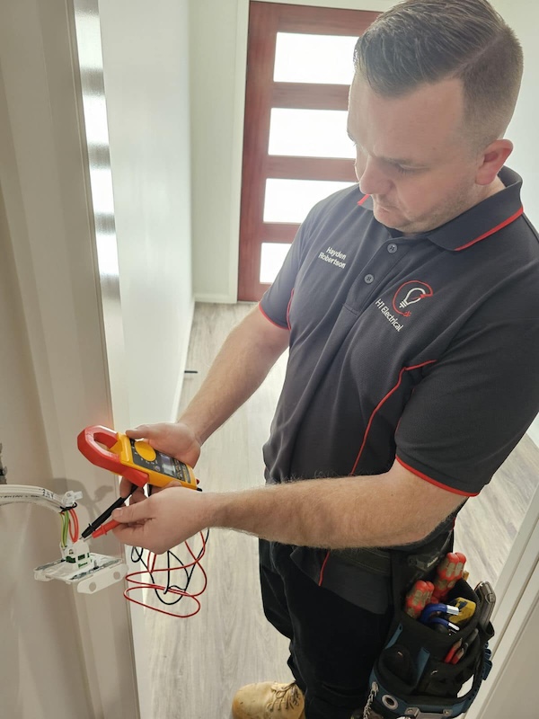 Hayden from H1 Electrical & Air testing circuits to trace an electrical fault in Cowra