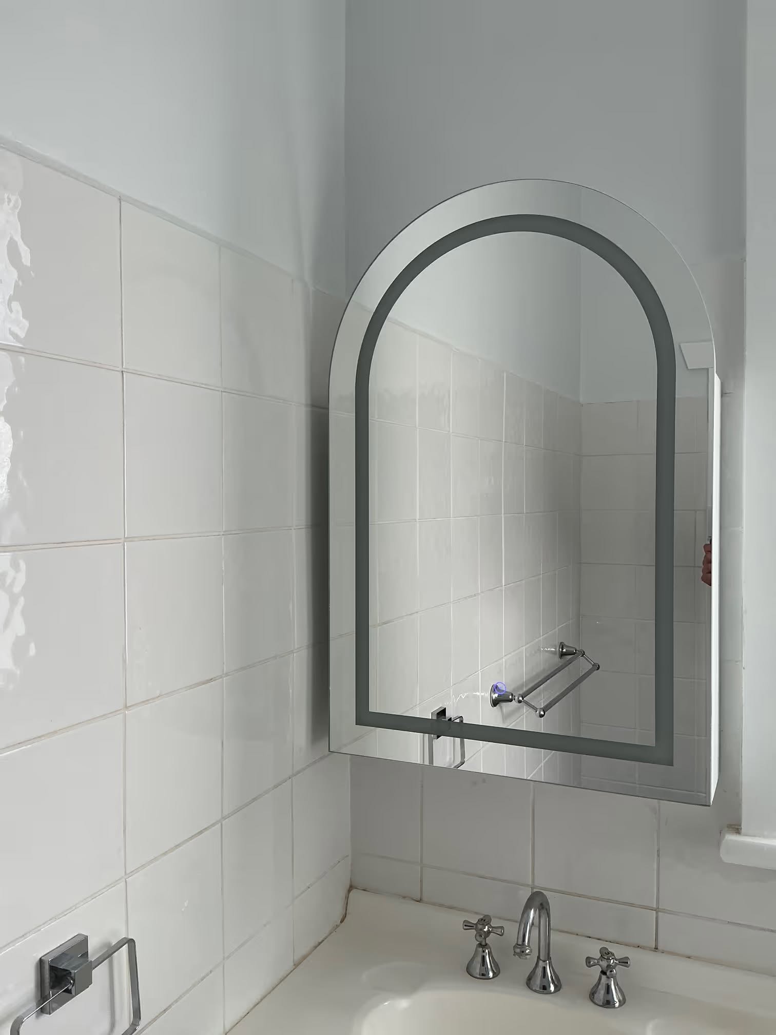 Arch LED backlit bathroom mirror with the light off, installed by H1 Electrical & Air in Cowra
