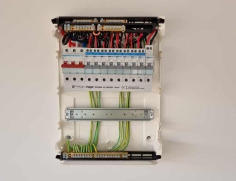 Neatly wired circuit-breaker board with tidy, colour-coded cabling by H1 Electrical & Air in Cowra